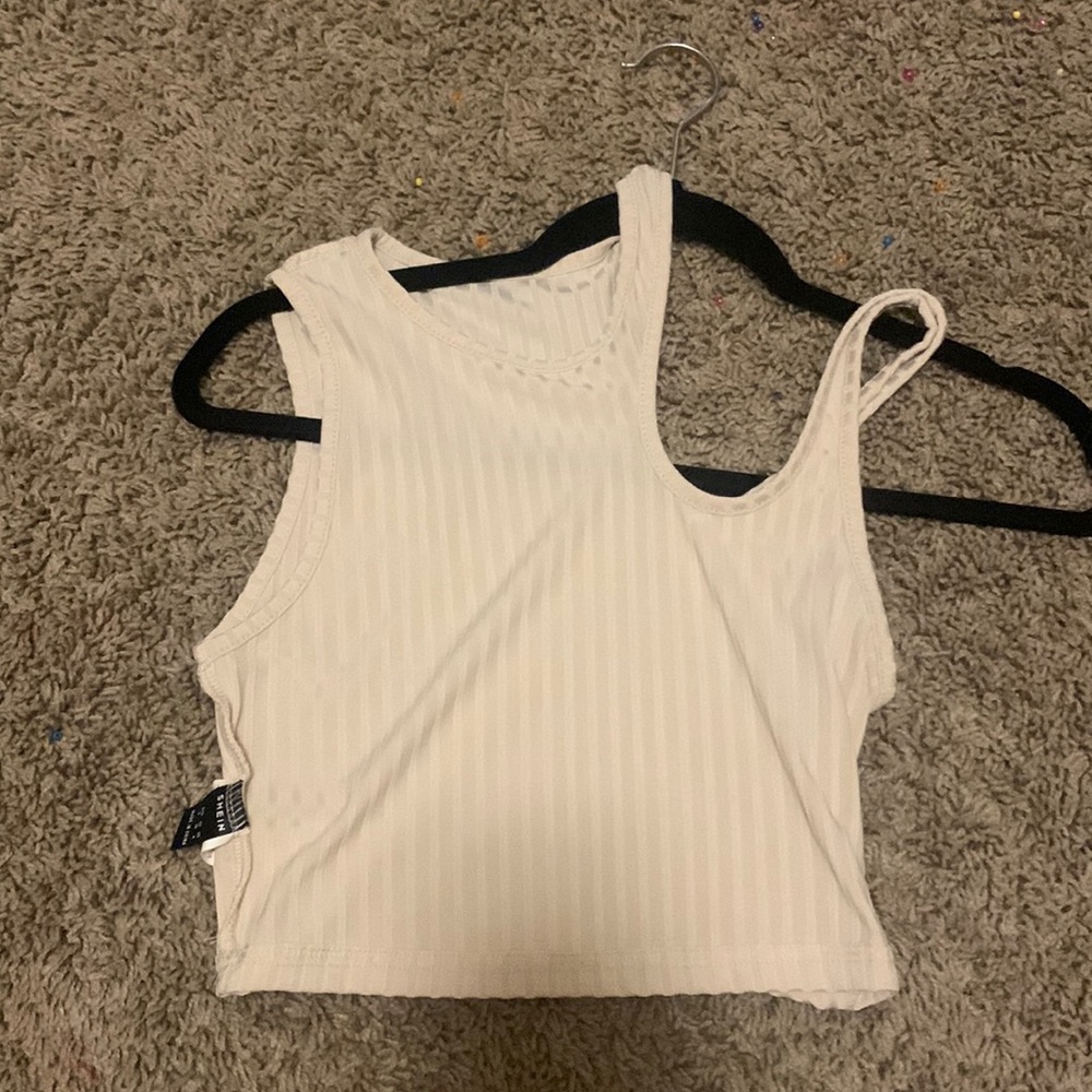 never been worn trendy asymmetrical top